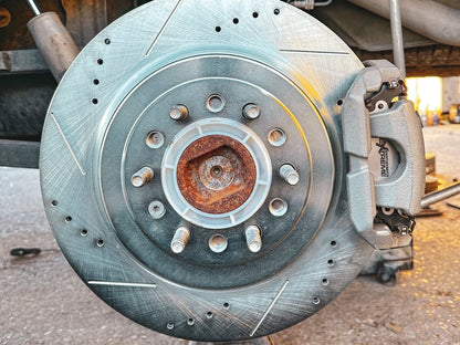 C&L Super Sport HD Cross-Drilled and Slotted Rotors; Rear Pair (19-25 RAM 1500, Excluding RHO & TRX)